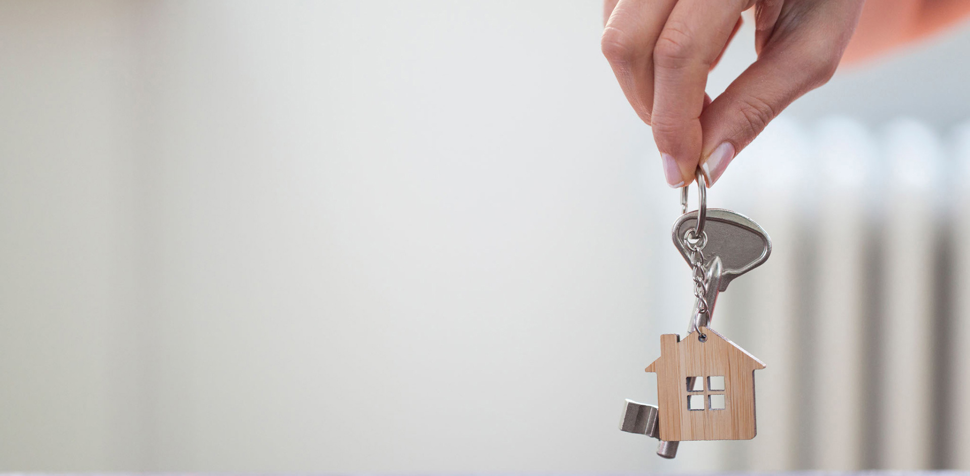 Someone holding the keys to their new home